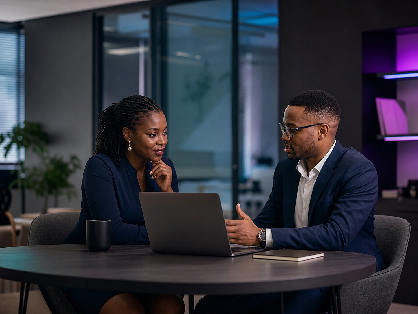 Business professionals discussing a digital project with Hilformation Concepts
